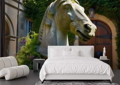 Timeless Stone Carved Horse Head Adorns the Entrance of a Traditional Home Wall mural