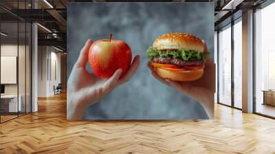 Healthy vs Unhealthy Food Choices: Hand Holding Fresh Apple and Burger. Nutritional Contrast Concept for Diet, Lifestyle, and Wellness Marketing. Minimalist Design with Elegant Composition and Texture Wall mural