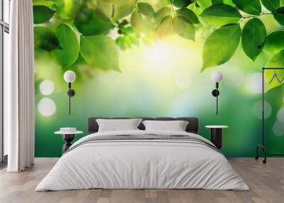 Abstract nature background with blurred green leaves and sunlight bokeh. Perfect for spring or summer designs. Wall mural