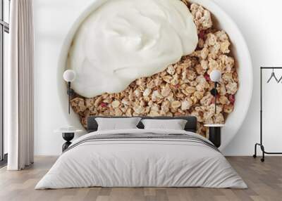 Bowl of whole grain muesli on white background Wall mural