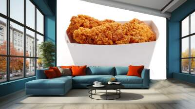 Fried breaded chicken wings in white cardboard box isolated Wall mural