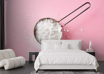 Powder sugar on pink background, from above Wall mural