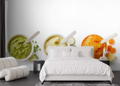 Three bowls of baby puree isolated on white from above Wall mural