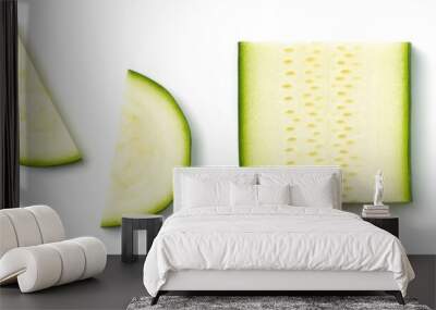 Zucchini slices isolated on white, from above Wall mural