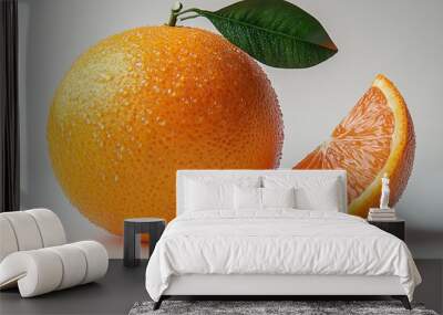 A fresh orange with a slice, glistening with water droplets. Wall mural