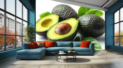 Three avocados, one cut open, showcasing their vibrant green flesh and seed. Wall mural