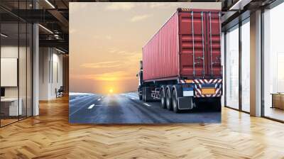 Truck on highway road with red  container, transportation concept.,import,export logistic industrial Transporting Land transport on the asphalt expressway with sunrise sky Wall mural