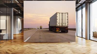 White Truck on highway road with  container, transportation concept.,import,export logistic industrial Transporting Land transport on the asphalt expressway Wall mural