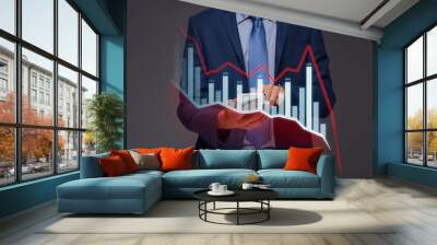 Businessman with chart in the fall, economy going down. Wall mural