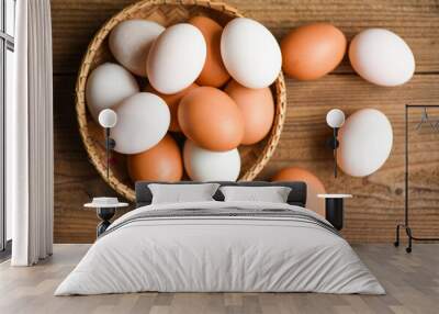 Chicken eggs and duck eggs collect from farm products natural in a basket healthy eating concept, Fresh egg. Wall mural