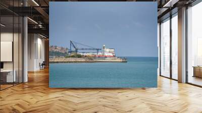 Crane Construction port for container ship in export and import business and logistics in harbor industry coast Wall mural