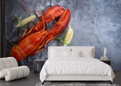 Fresh lobster food on a black plate background - red lobster dinner seafood with herb spices lemon rosemary served table and ice in the restaurant gourmet food healthy boiled lobster cooked Wall mural