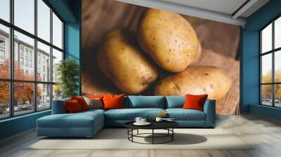 Fresh potato on the sack, ripe potato harvest of  potatoes agricultural products for cooking Wall mural