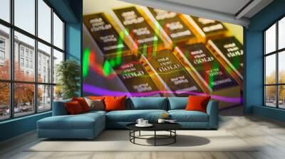 Gold trading, gold bars on fabric with stock graph chart stock market trade background, pile of gold bars financial business economy concepts, wealth and reserve success in business and finance Wall mural