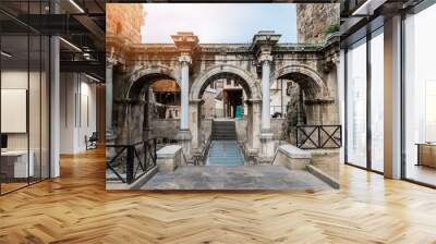 Resort city Antalya turkey travel famous landmark - arch walkway architecture view of Hadrian's Gate in old city Wall mural