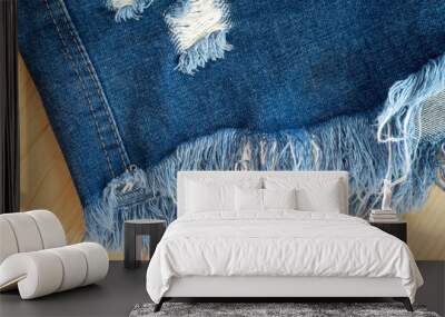 Close up of  blue denim jeans fabric texture background. Wall mural