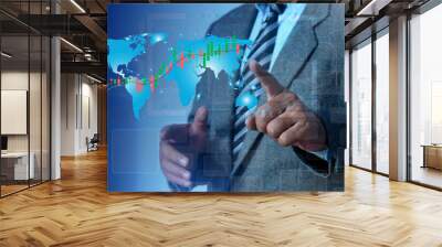 Concept businessman point digital hologram Stock market investment trading world map financial chart with candlestick line graph. Wall mural