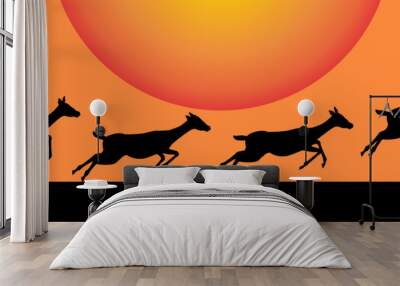 Reindeer silhouette on sunset orange background. Vector illustration. Wall mural