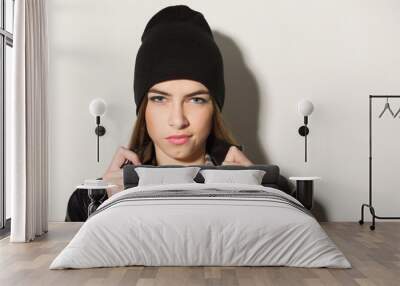 Cute hipster teenage girl with black beanie hat Wall mural