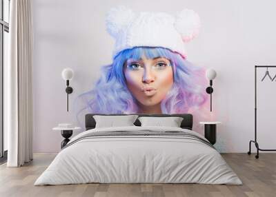 Cute young fashion woman with pastel purple and pink hair and makeup Wall mural