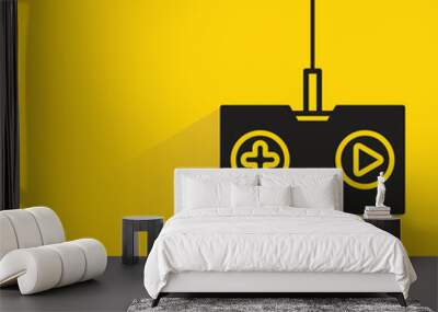 video game joystick with shadow on yellow background Wall mural