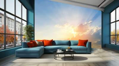 Beautiful dramatic sky clouds with light rays at sunset. Natural landscape for background Wall mural