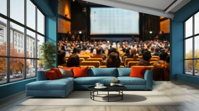 audience listening to seminar in conference hall with large cinema screen event photography Wall mural