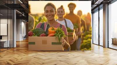 diverse group of smiling people carrying boxes of fresh produce from a sundrenched farm field vibrant vegetables and fruits overflow symbolizing community sustainability and healthy living Wall mural