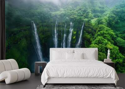 ethereal waterfall cascading through misty gorge viewed from above vivid turquoise waters contrast with lush green surroundings creating a dreamlike aerial landscape Wall mural