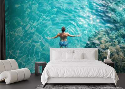 man enjoying summer vacation swimming in clear blue ocean water travel photography Wall mural