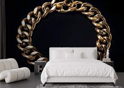 Object with gold chain set against black background image Wall mural