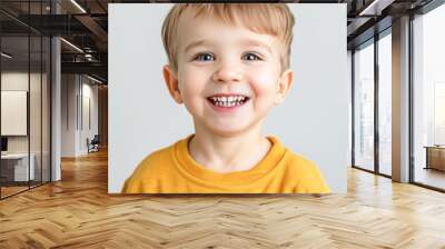 cute little boy smiling on white background Wall mural