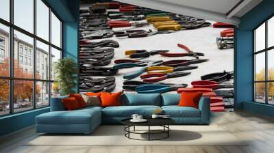 Retro colorful second hand metal wrenches sold on flea market. Wall mural