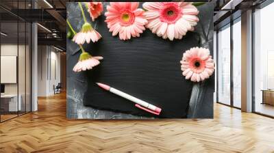 Top view of decoration slate with flower. teacher day concept. Wall mural