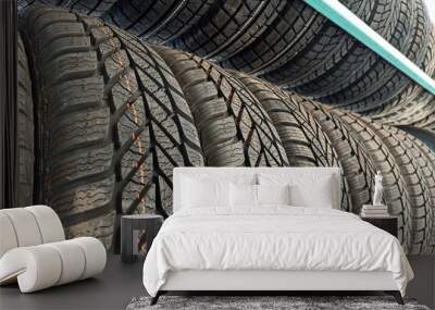 Many black rubber car tires on store shelf for sale. Wall mural