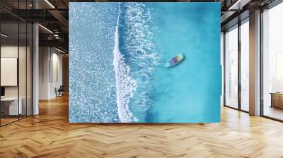 Wave and boat on the beach as a background. Beautiful natural background at the summer time from air Wall mural