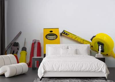 Top view of Working tools of a handy man on white background.flat lay design. Wall mural