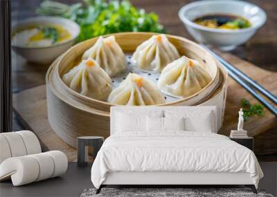 Xiao Long Bao dumplings served in a bamboo steamer. Wall mural