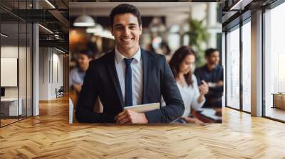 Portrait of people young hispanic successful handsome businessman with team working together at office. Diverse ethnic employees with Mexican leader in suit and tie smiling. Wall mural