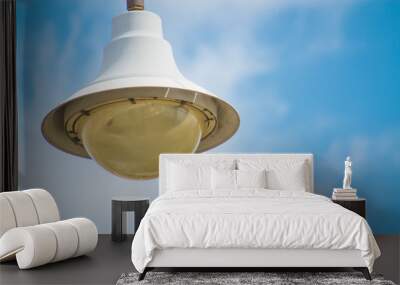 lamp on blue sky. Wall mural