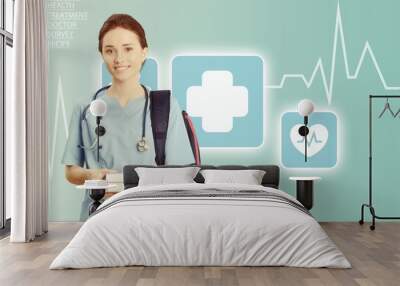 Attractive young female doctor student on background Wall mural