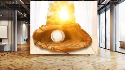 Baseball glove with a ball in it - isolated image Wall mural