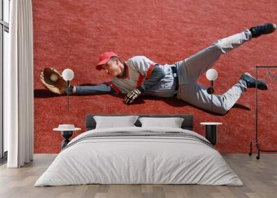 Baseball Player Diving to Catch the Ball Wall mural