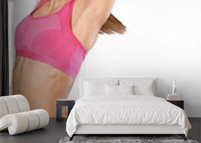 Beautiful young woman doing her workout   isolated white background Wall mural