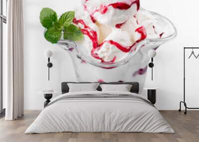 Berry ice cream in glass bowl on white background Wall mural