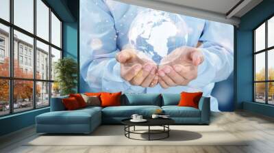 businessman holding Global network connection. Big data analytics and intelligence concept. World map Wall mural