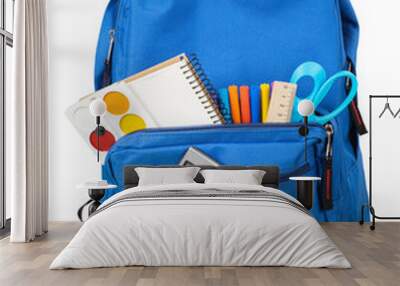 Classic school backpack with colorful school supplies and books Wall mural