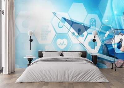 Close-up Doctor at hospital working with tablet pc Wall mural