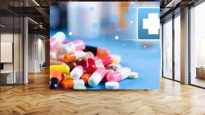 Colorful pills and tablets on background Wall mural