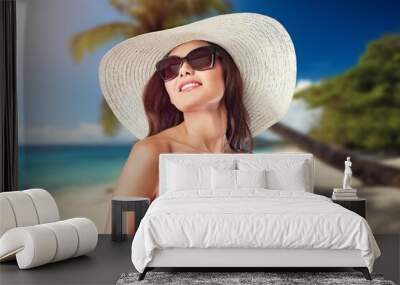 Cool person with summer clothes travel on the beach Wall mural